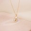 Pendentif petite Vierge forme Goutte entourage Oxydes