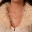 Croix Christ ciselée Etoilée